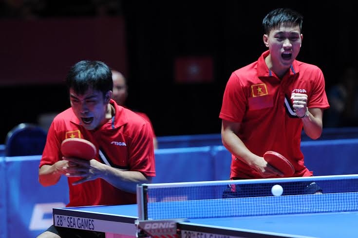 Trần Tuấn Quỳnh/Nguyễn Anh Tú mang về tấm huy chương đầu tiên cho đoàn thể thao Việt Nam (TTVN) tại SEA Games 28. Ảnh: Anh Tuấn.