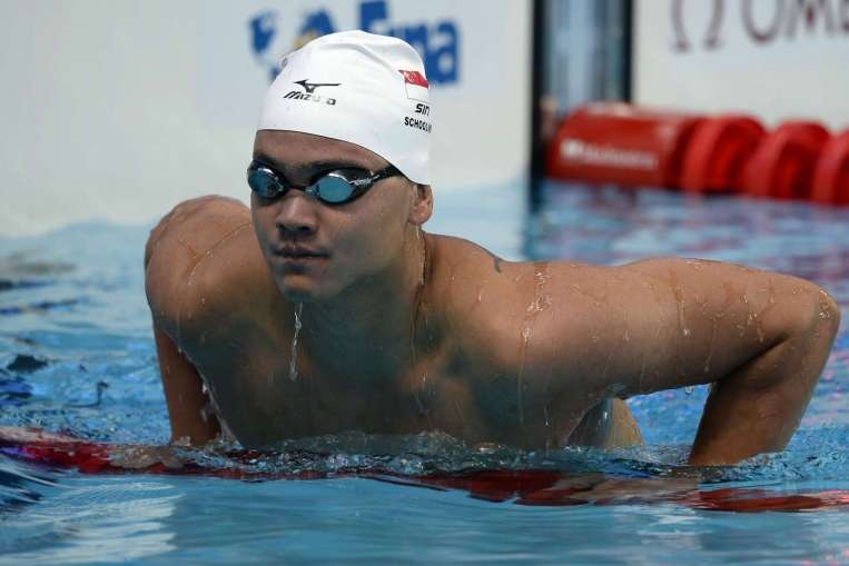 Schooling vuot mat nha vo dich Olympic hinh anh