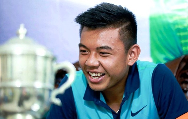 Nghi Tet ngan ngui, Ly Hoang Nam sang Trung Quoc danh giai hinh anh