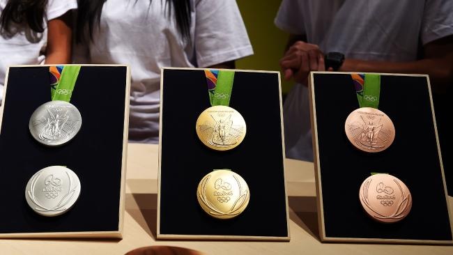 Tiền thưởng HCV của Hoàng Xuân Vinh ảnh 2 Tien thuong HCV cua Hoang Xuan Vinh anh 2