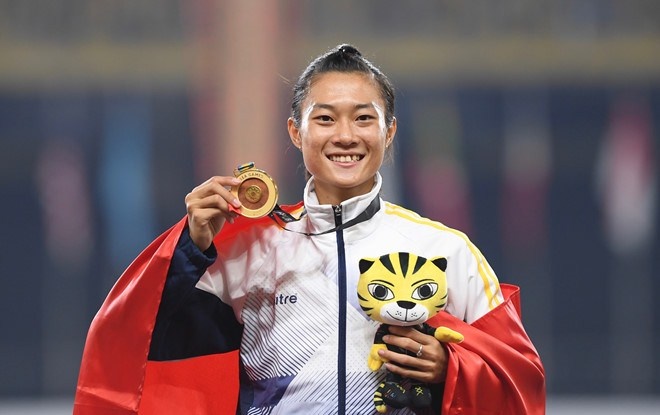 Bao Malaysia ca ngoi Tu Chinh - 'nguoi phu nu chay nhanh nhat DNA' hinh anh