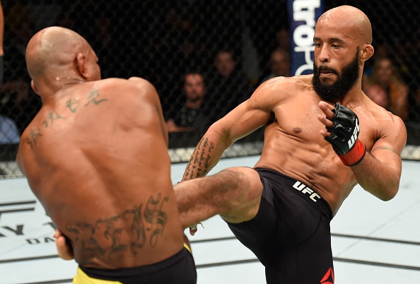 Tran dau giua Demetrious Johnson va Wilson Reis hinh anh