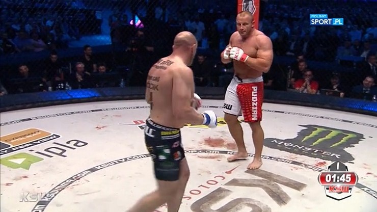 Tran dau giua Mariusz Pudzianowski va Tyberiusz Kowalczyk hinh anh