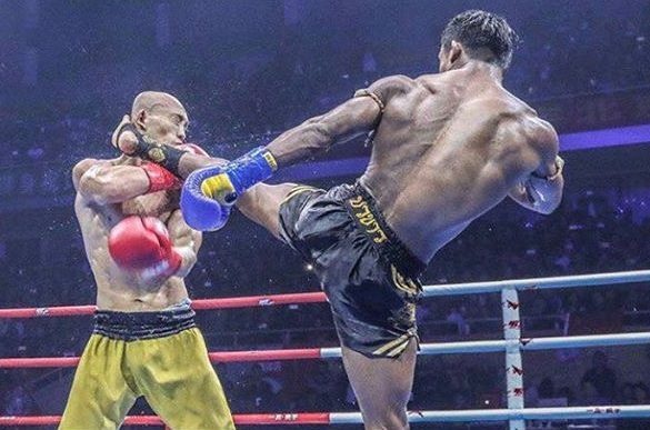 Chien thang gay tranh cai cua Nhat Long truoc Buakaw hinh anh