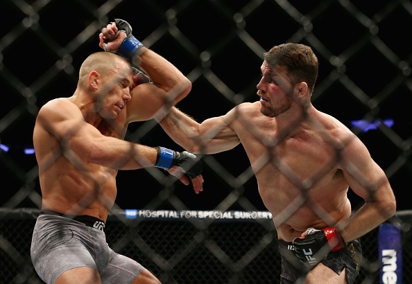 UFC 214: Ba nha vo dich mat dai,  ky luc moi duoc GSP thiet lap anh 4