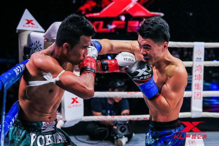 Tran dau cang thang giua Yang Zhuo va Singdam Kiatmuu hinh anh