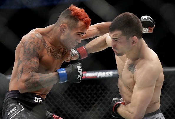 UFC 27: Võ sĩ hạ gục đối thủ bằng cú đấm vào gan ảnh 3 UFC 27: Vo si ha guc doi thu bang cu dam vao gan anh 3