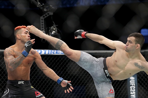 UFC 27: Võ sĩ hạ gục đối thủ bằng cú đấm vào gan ảnh 5 UFC 27: Vo si ha guc doi thu bang cu dam vao gan anh 5