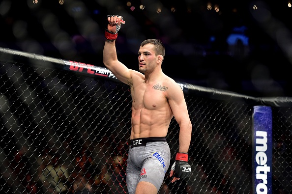 UFC 27: Võ sĩ hạ gục đối thủ bằng cú đấm vào gan ảnh 8 UFC 27: Vo si ha guc doi thu bang cu dam vao gan anh 8