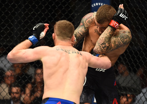 UFC on Fox 29: Nha cuu vo dich the gioi bi danh bai trong 'tran dau hay nhat nam' anh 7