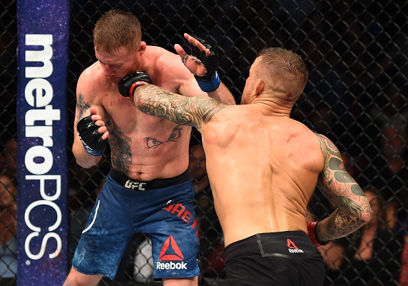 UFC on Fox 29: Nha cuu vo dich the gioi bi danh bai trong 'tran dau hay nhat nam' anh 8