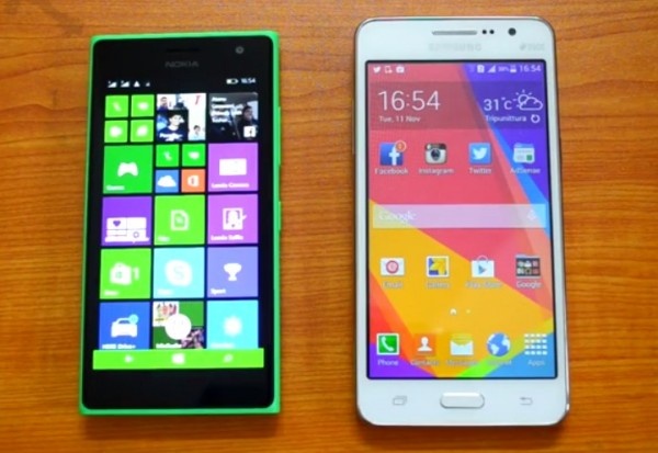 Nokia Lumia 730 (trái) và Samsung Galaxy Grand Prime đại diện cho một phân khúc mới: smartphone chụp ảnh tự sướng giá rẻ tại Việt Nam. Ảnh: Mynokiablog.
