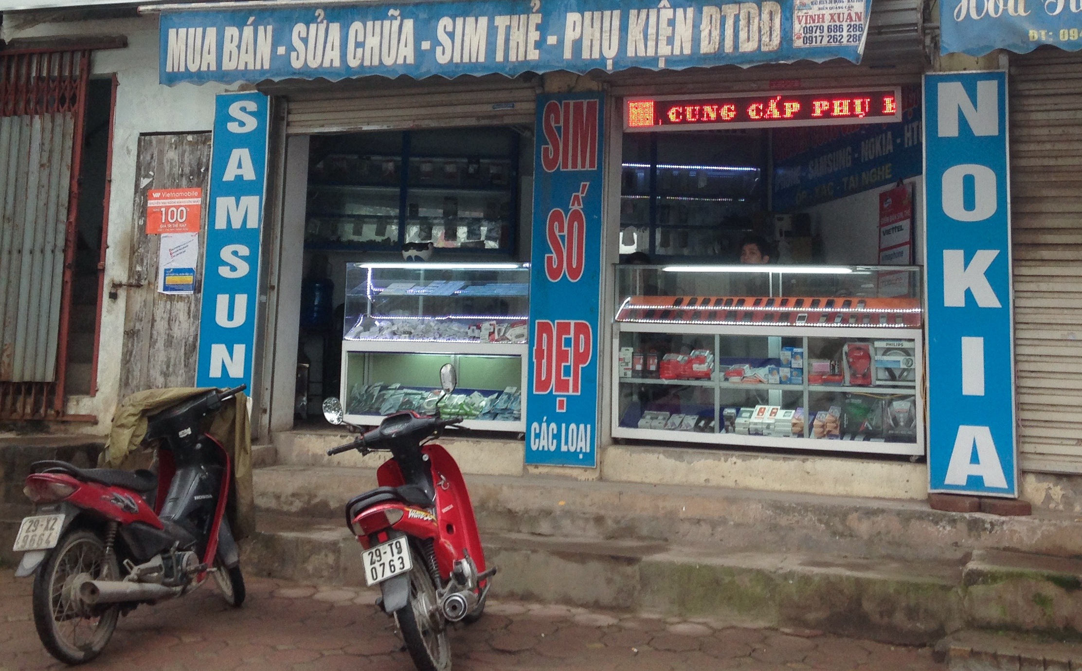 Cua hang di dong nho tim cua song khi 'ong lon' banh truong hinh anh