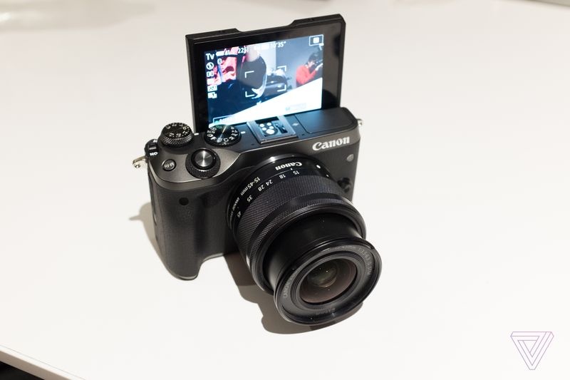 Canon tung 3 may anh moi, gia tam thap hinh anh