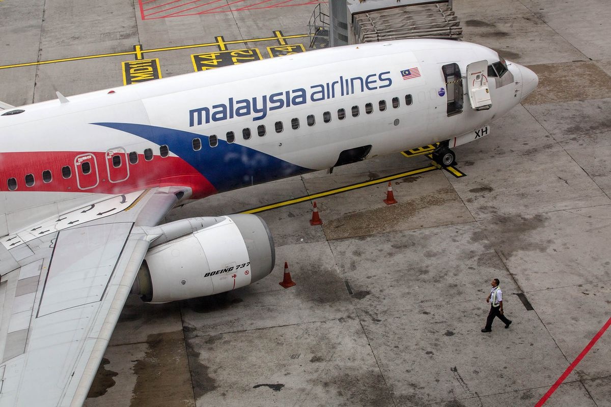 Malaysia Airlines theo doi may bay bang ve tinh, tranh tham hoa MH370 hinh anh
