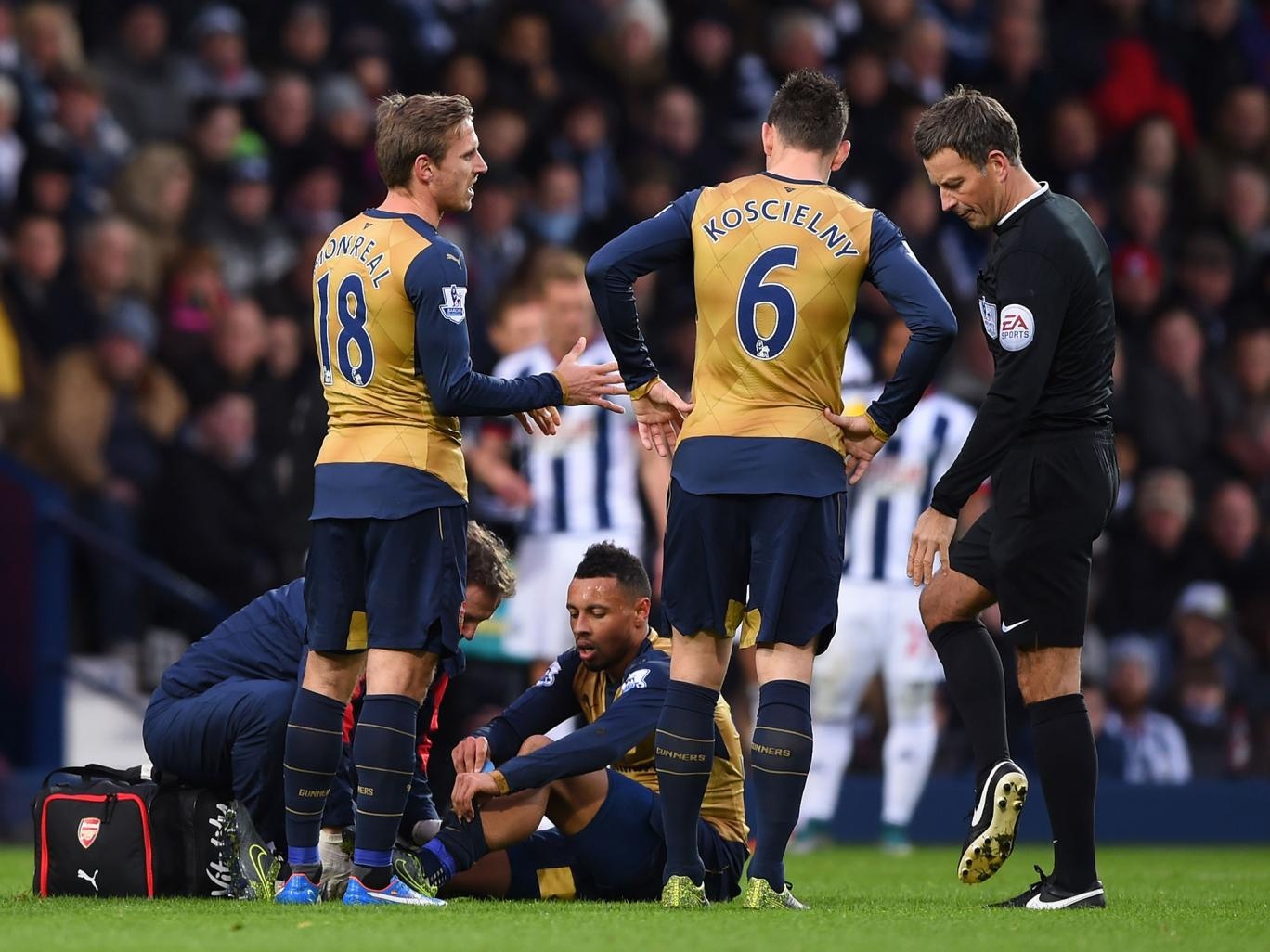 Coquelin chấn thương và Arsenal không biết phải dùng ai để thay cầu thủ này. Ảnh: Getty Images.