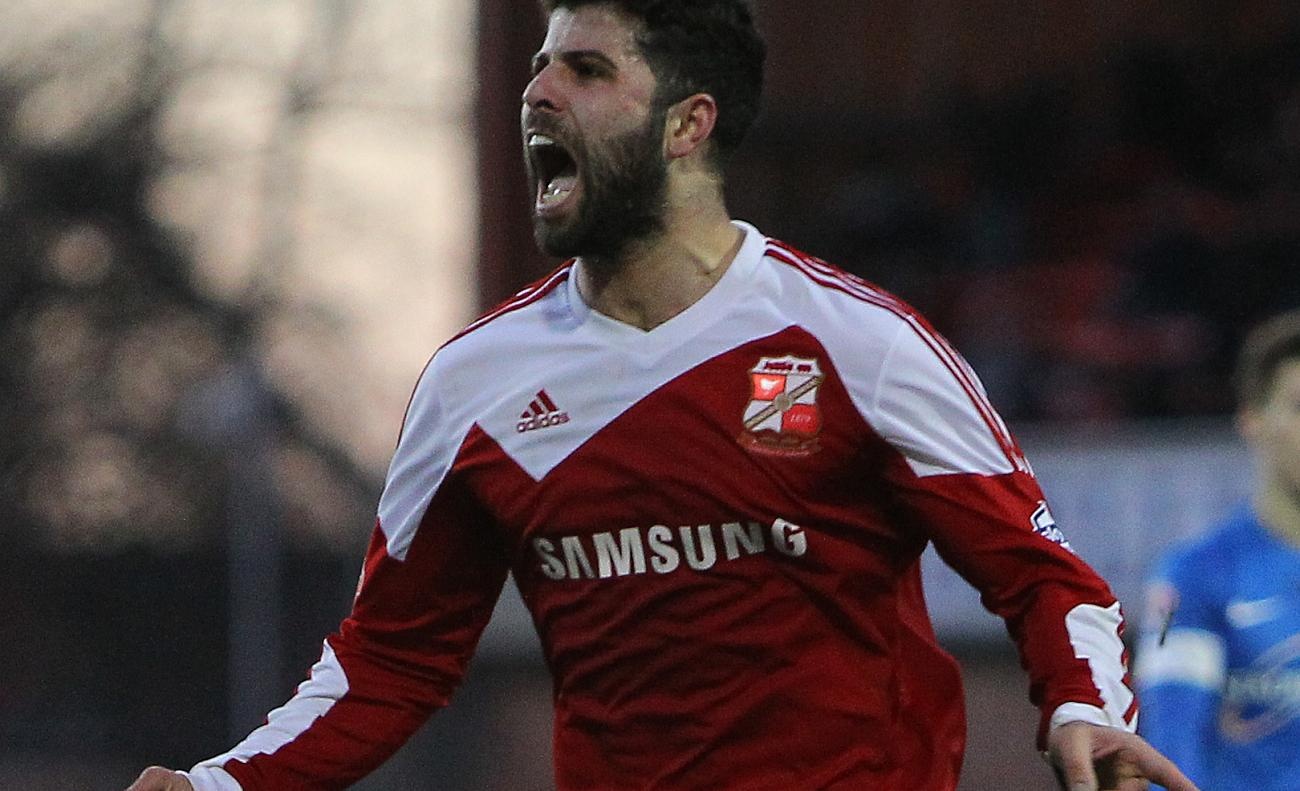 Ngoi sao Iraq hoi tuong ky uc choi bong vung chien su hinh anh