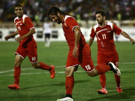 Bong da Syria vuot kho thoi noi chien anh 1