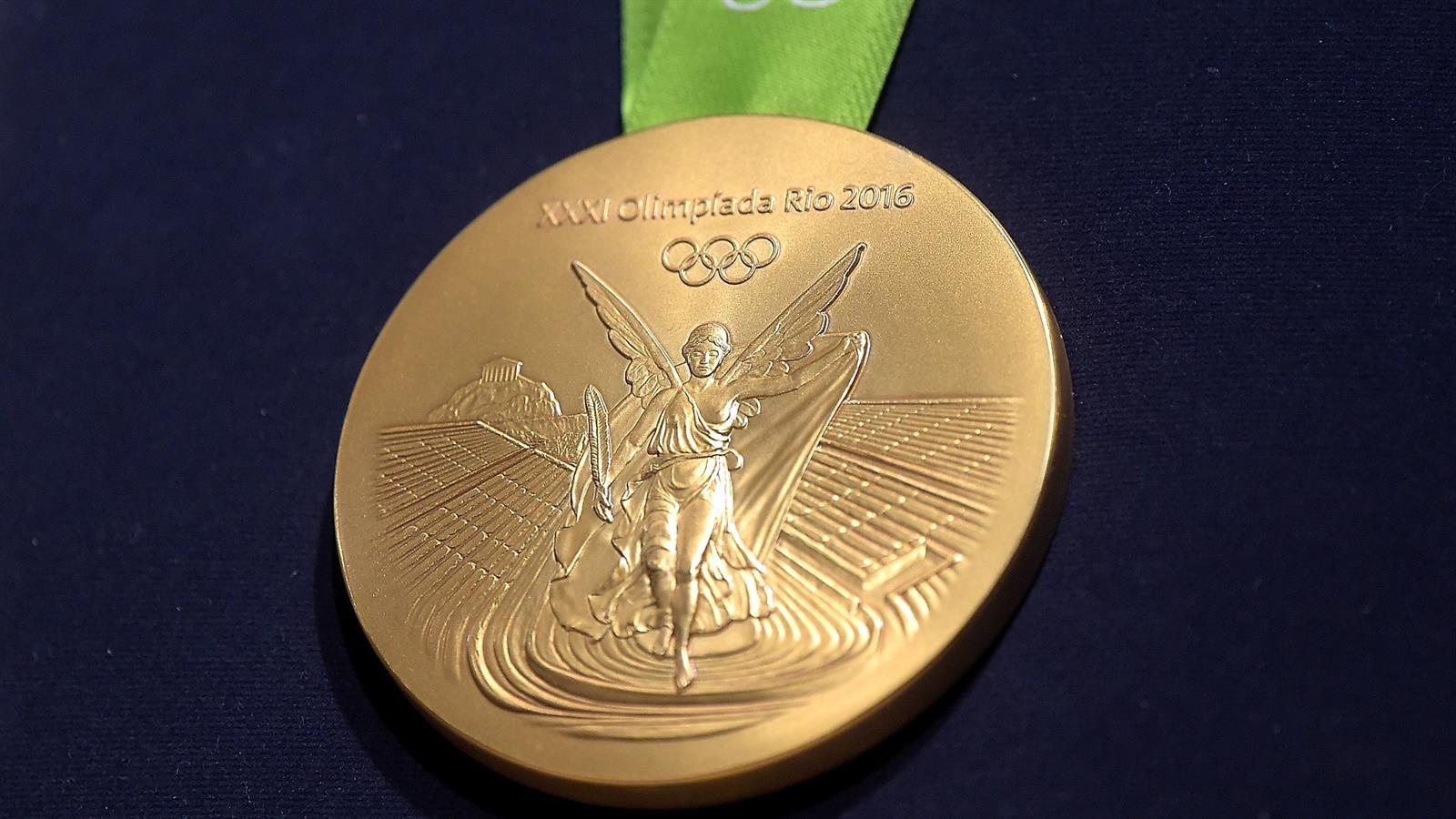 Vinh quang nào cho huy chương vàng Olympics? ảnh 3 Vinh quang nao cho huy chuong vang Olympics? anh 3
