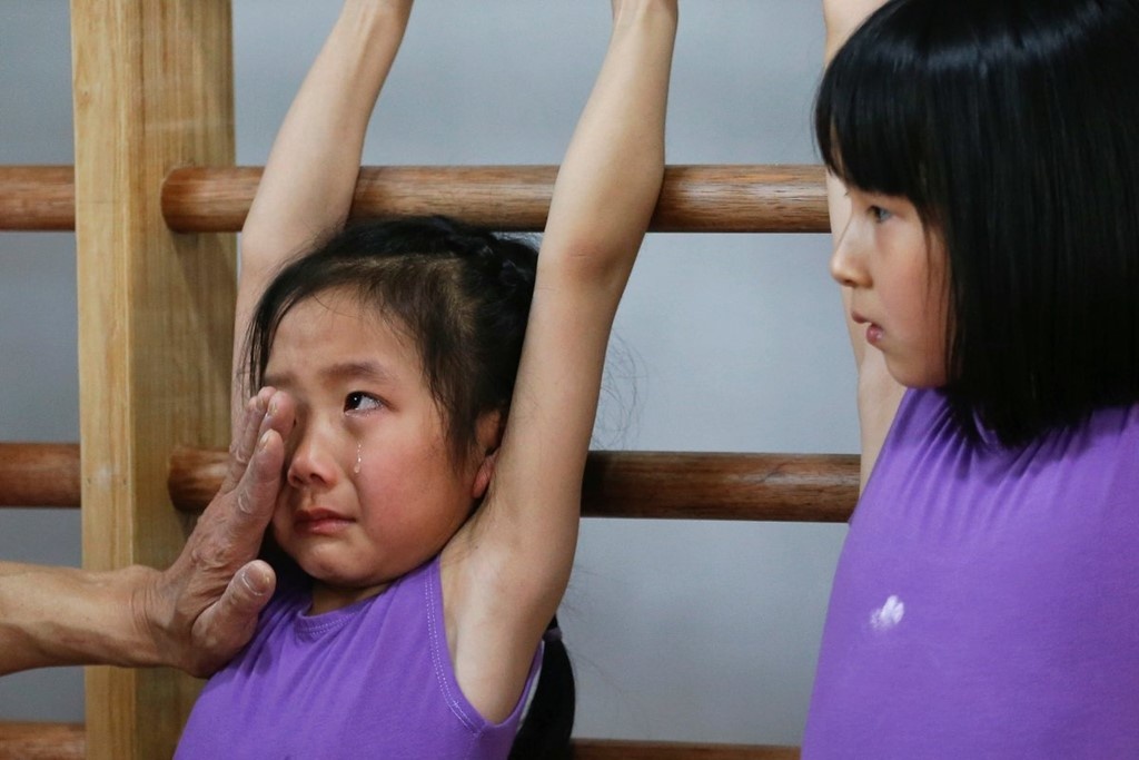 Su that den toi sau nhung tam HCV Olympic cua Trung Quoc hinh anh
