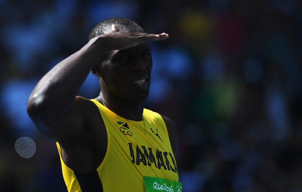 Nu cuoi Usain Bolt va chan gia tri tuong dai hinh anh