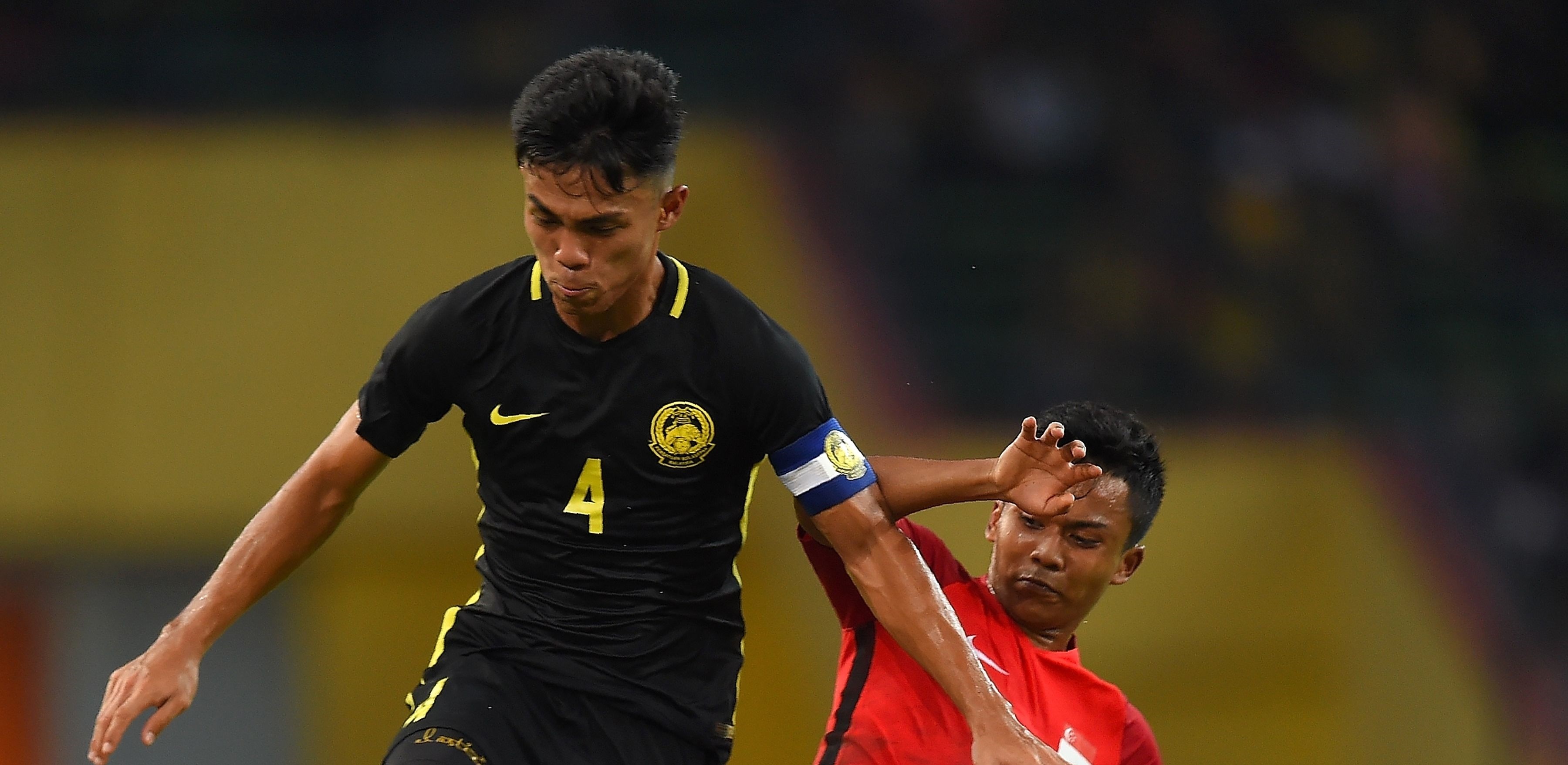 Ghi 2 ban trong 6 phut, U22 Malaysia nhan chim Singapore hinh anh