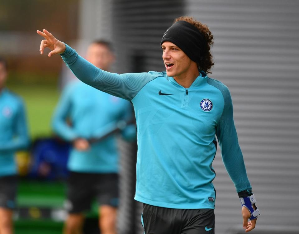 HLV Conte dung ban tay sat de 'tri' David Luiz anh 2