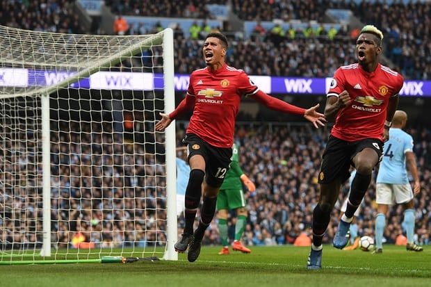 Chris Smalling: 'MU khong muon lam ke he nhin Man City vo dich' anh 1