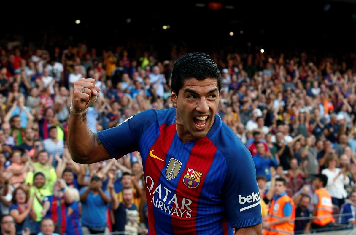 Dau roi nanh vuot cua Luis Suarez? hinh anh