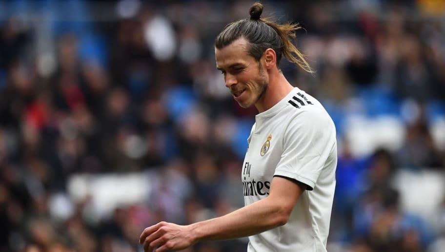 Gareth Bale truoc vien canh phai toi Trung Quoc thi dau hinh anh