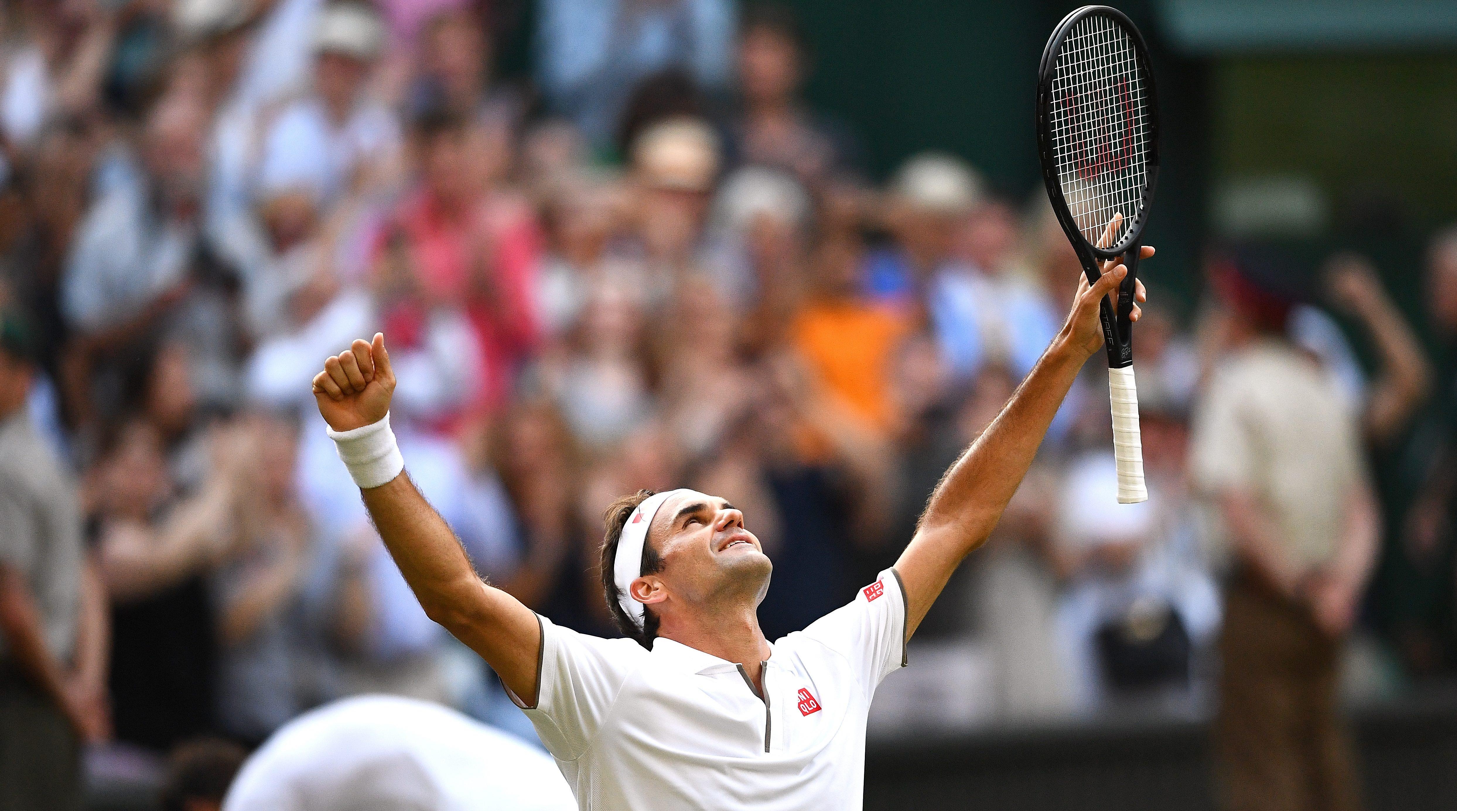 Ha Nadal, Federer chinh phuc su tan bao cua thoi gian hinh anh