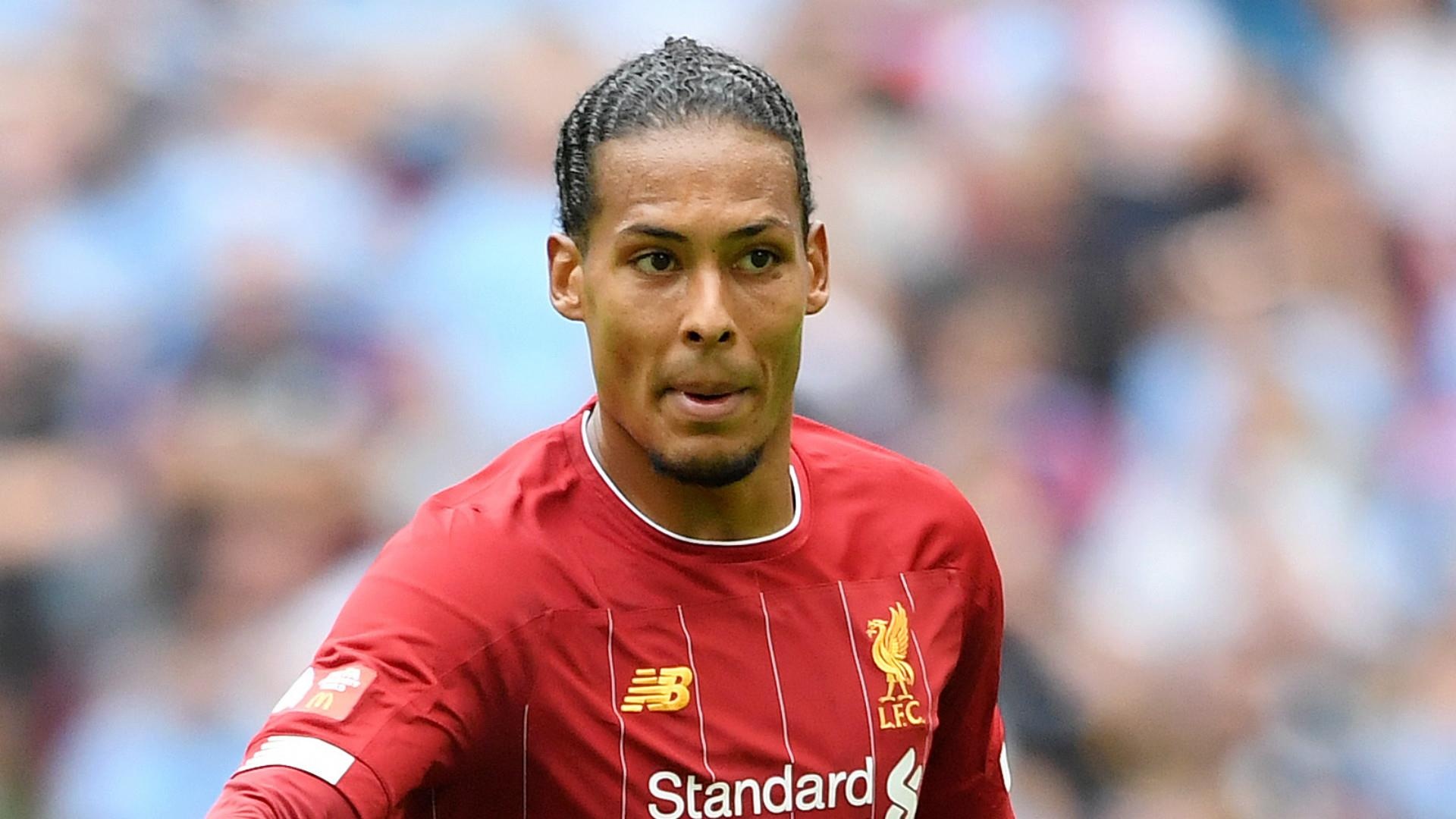Den luc Virgil van Dijk ha be Messi va Ronaldo hinh anh