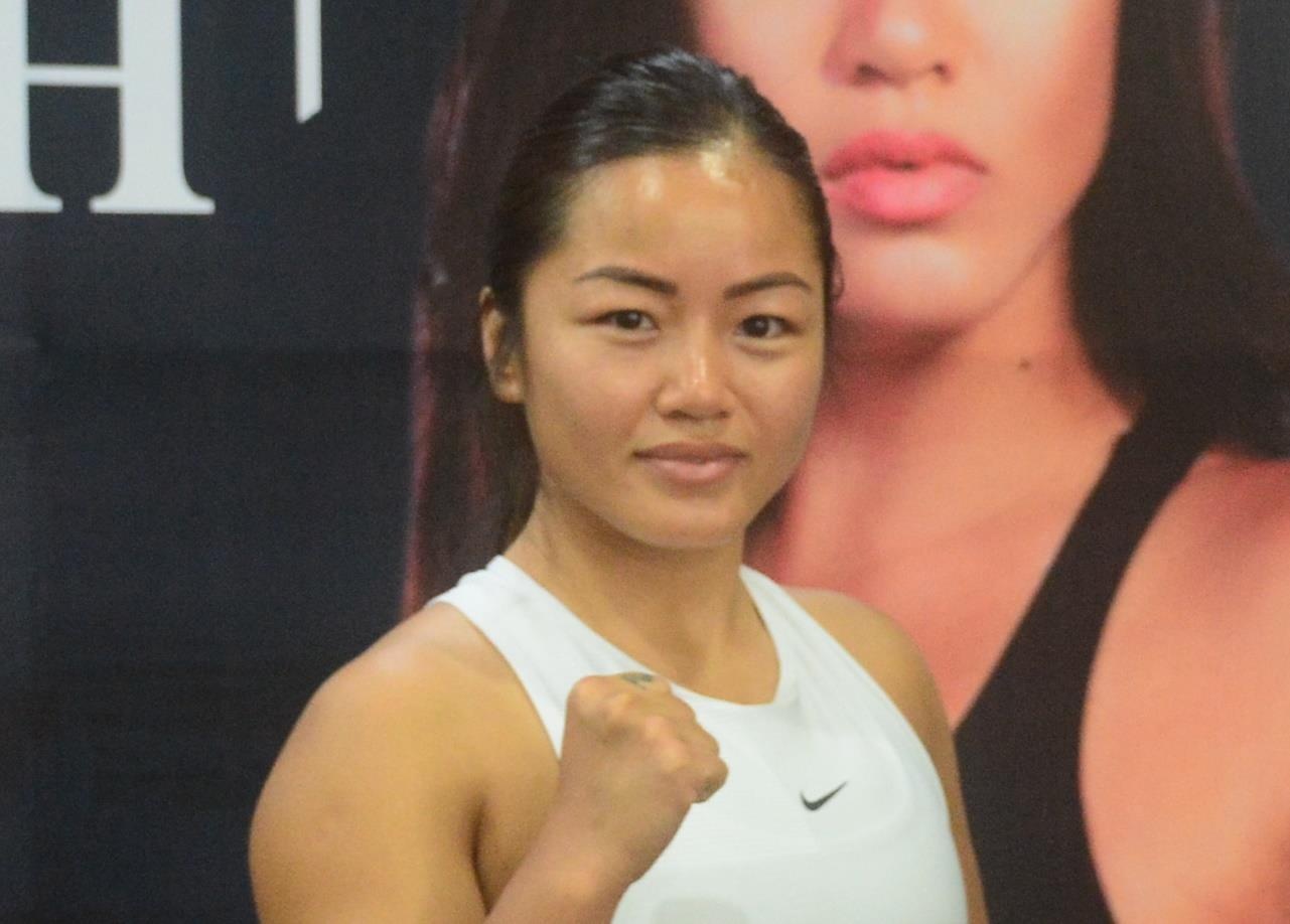 Nu vo si goc Viet ke chuyen bi bao hanh the xac hinh anh