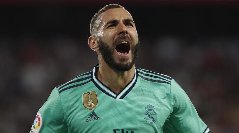 Benzema ruc sang dua Real Madrid len top dau La Liga hinh anh