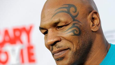 Mike Tyson di chuyen va ra don manh me hinh anh