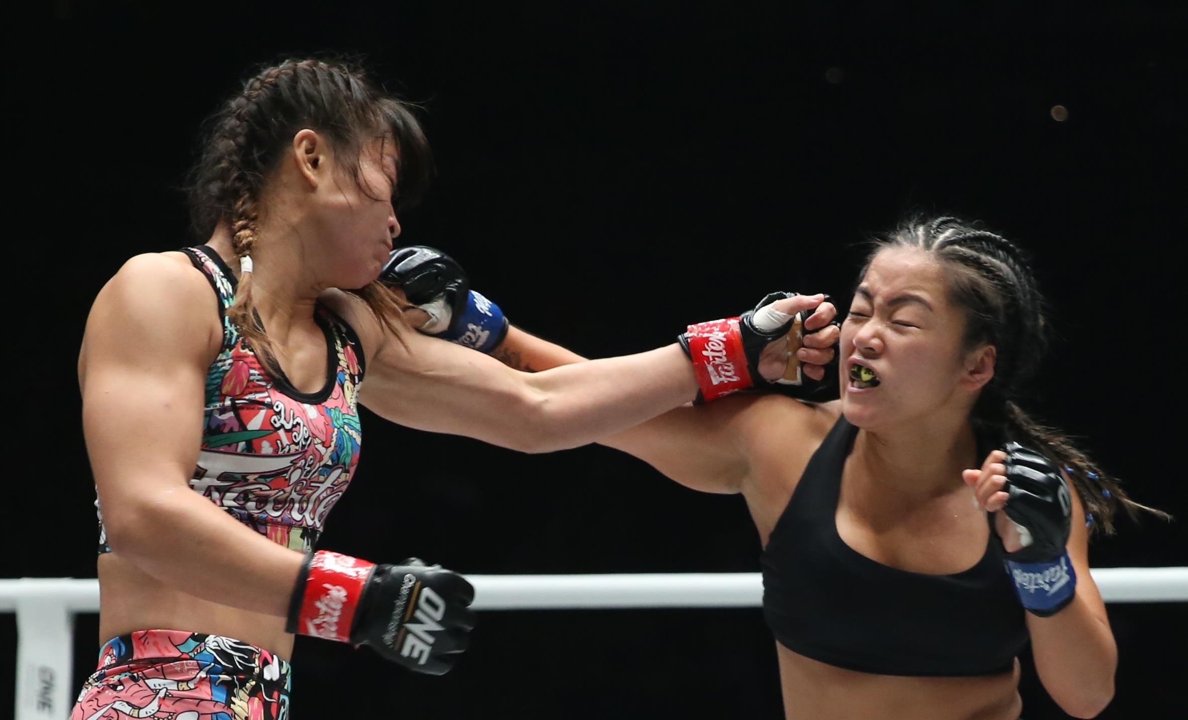 Dang cap giup nu vo si Thai Lan ha Bi Nguyen hinh anh