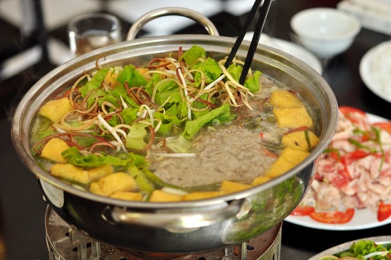 'Da' nhu an lau rieu be be, bo ba chi My sau ngay mua bao hinh anh