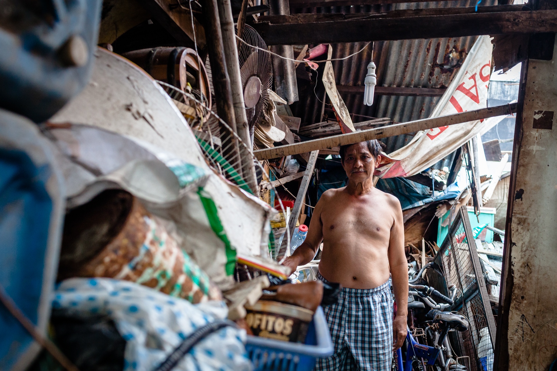 Nhung nguoi cuoi cung o 'khu o chuot' sap bi giai toa giua Sai Gon hinh anh