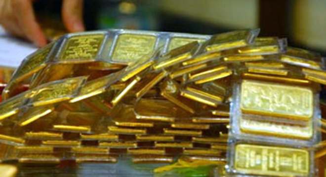 Vang sut gia sau khi FED cat giam QE3 hinh anh