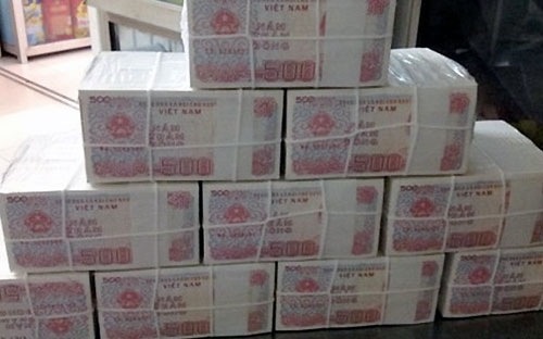 Vi sao Ngan hang Nha nuoc thoi in tien menh gia nho? hinh anh