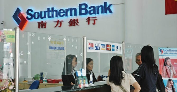 Southern Bank chinh thuc ve 'mot nha' voi Sacombank hinh anh