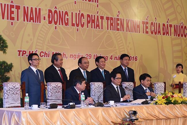 Ha Noi, TP HCM cam ket tao dieu kien thuan loi cho DN hinh anh