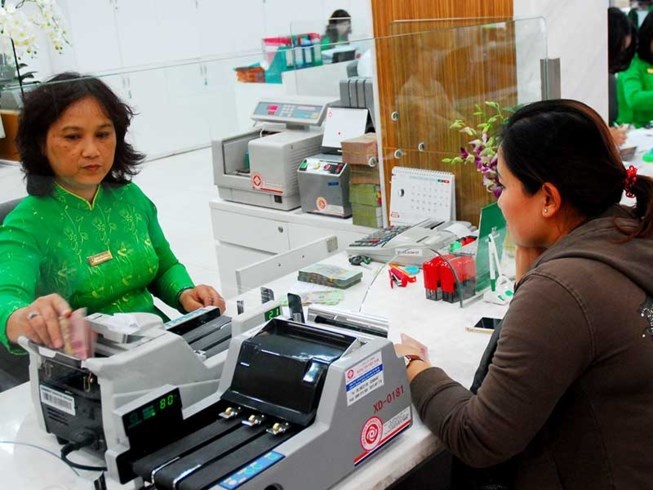 Danh thue nang nguoi vay tien nhieu hinh anh