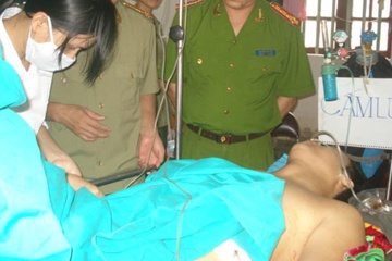 Bi chem vao dau, trung uy canh sat van bat duoc cuop hinh anh