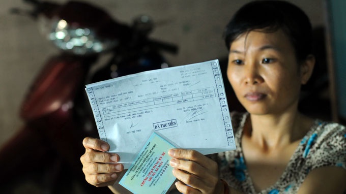 Xe khong chinh chu: Nguoi bi phat oan chua duoc tra lai tien hinh anh