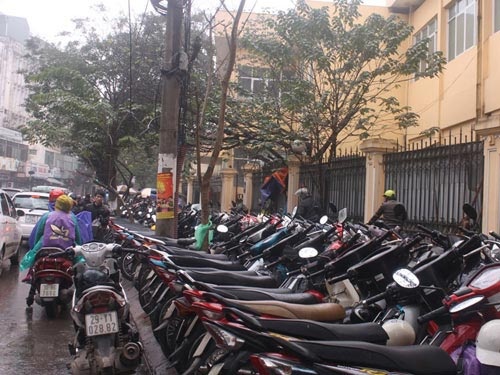 Ha Noi tang phi giu xe, phi ve sinh hinh anh