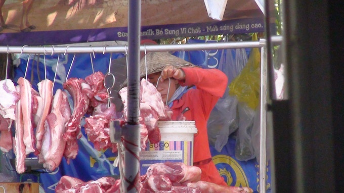Clip vo tu ‘tam' han the cho thit heo o Sai Gon hinh anh
