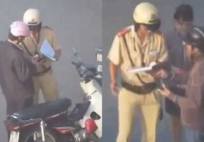 Buoc canh sat giao thong bi to soi vi phai xem lai clip hinh anh