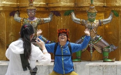 Trung Quoc ra tay chan chinh dan di du lich nuoc ngoai hinh anh