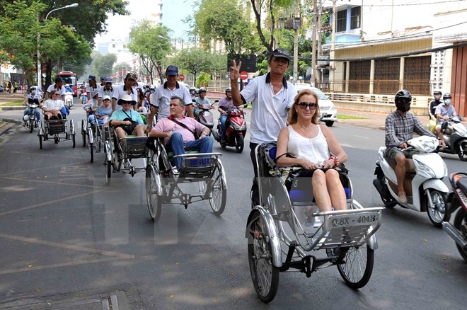 Hon 2 trieu luot khach quoc te den TP HCM trong nua dau nam hinh anh